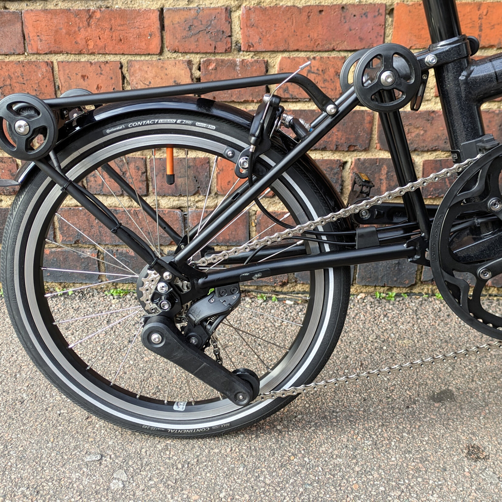 Brompton EX-DEMO Electric P Line 4 Speed High Folding Bike with Roller Rack - Midnight Black Metallic