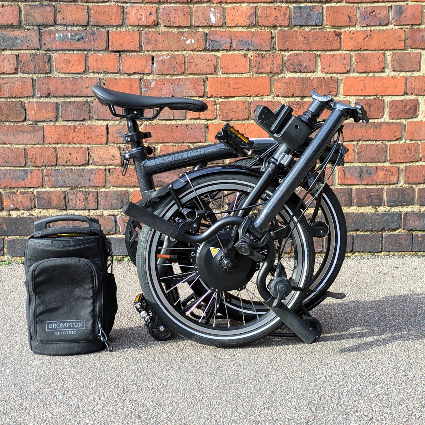Brompton EX-DEMO Electric P Line 4 Speed High Folding Bike with Roller Rack - Midnight Black Metallic
