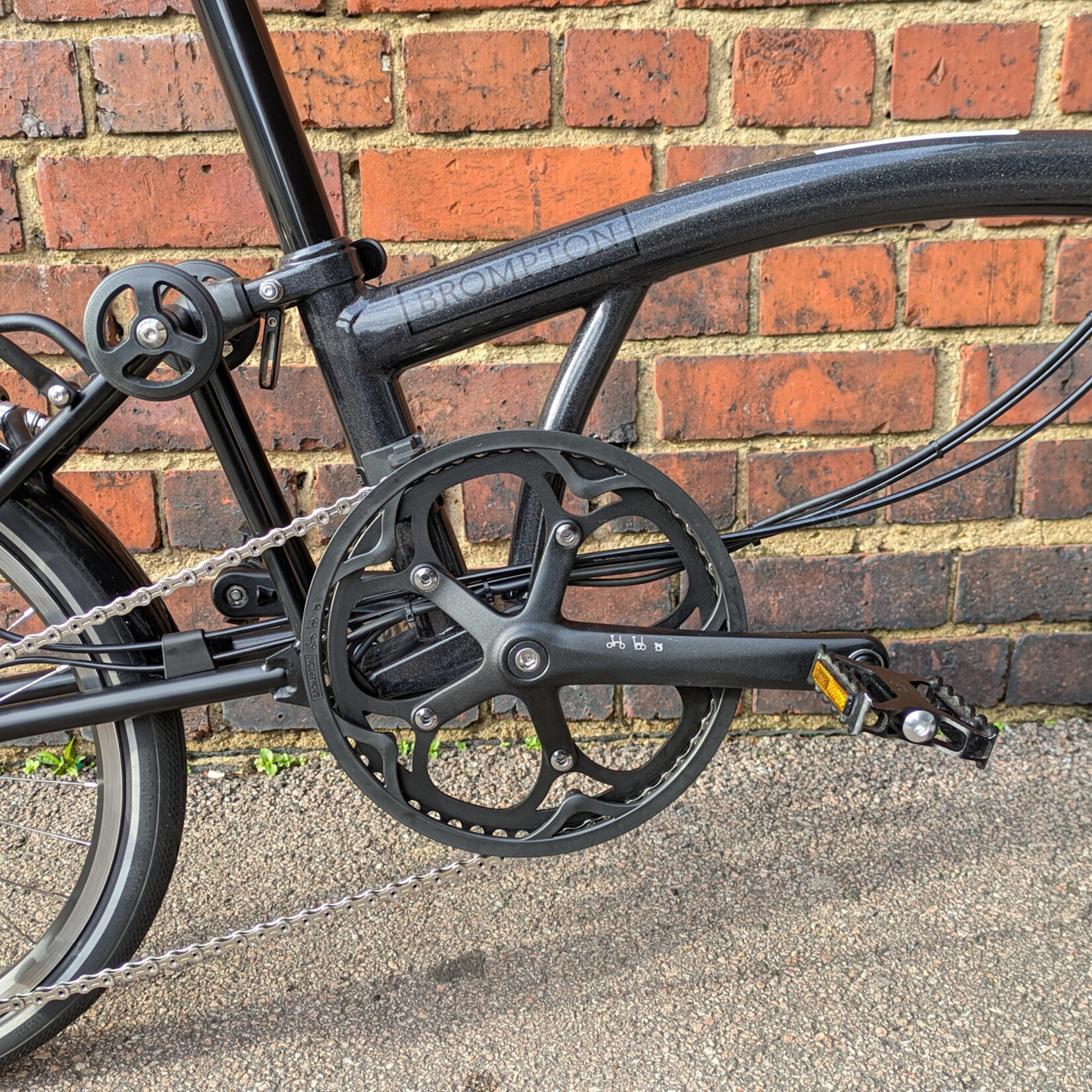 Brompton EX-DEMO Electric P Line 4 Speed High Folding Bike with Roller Rack - Midnight Black Metallic