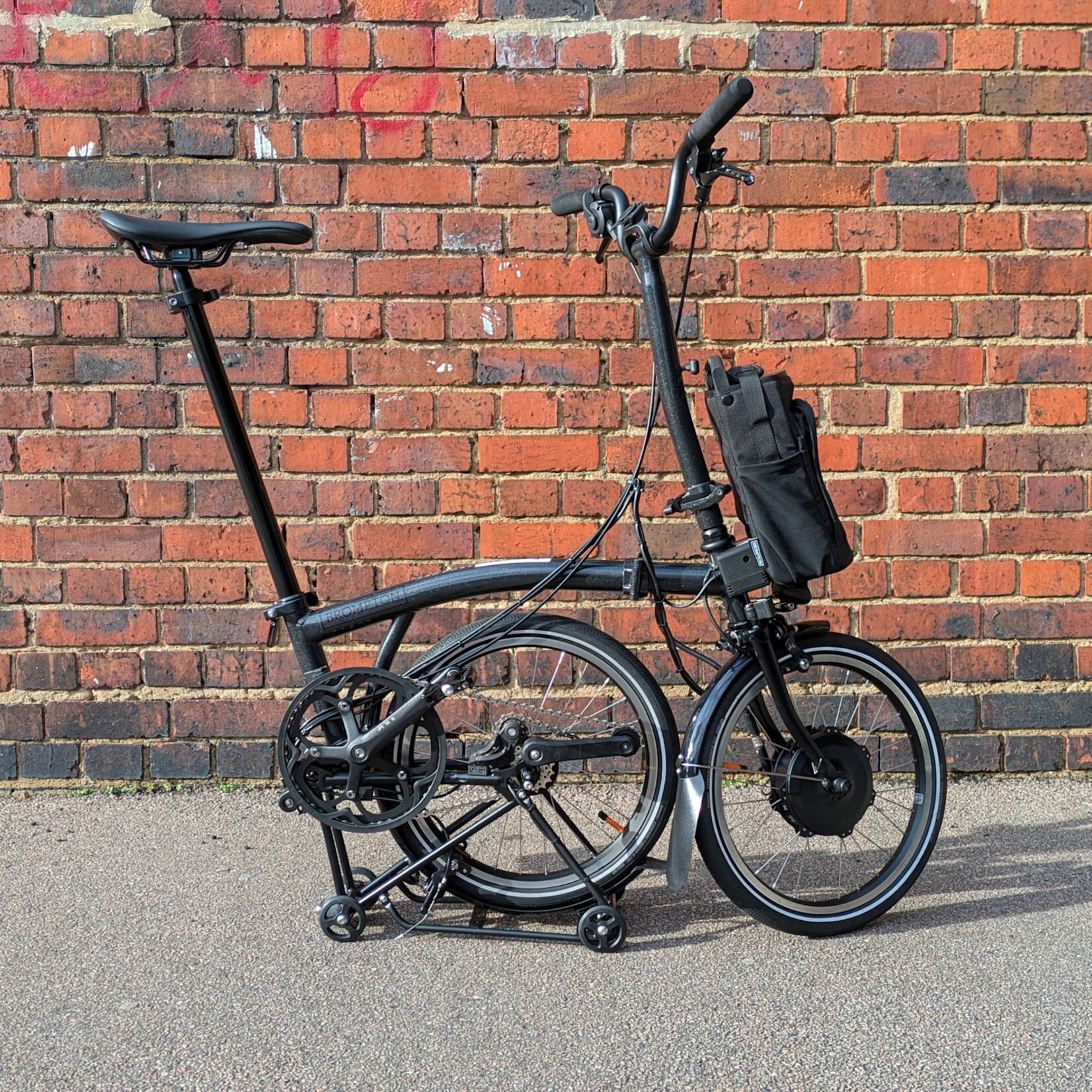 Brompton EX-DEMO Electric P Line 4 Speed High Folding Bike with Roller Rack - Midnight Black Metallic