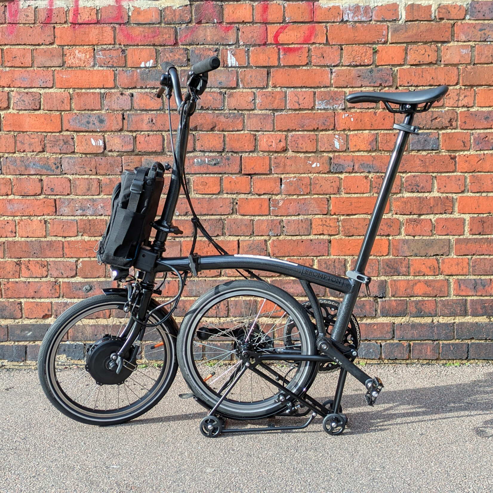 Brompton EX-DEMO Electric P Line 4 Speed High Folding Bike with Roller Rack - Midnight Black Metallic