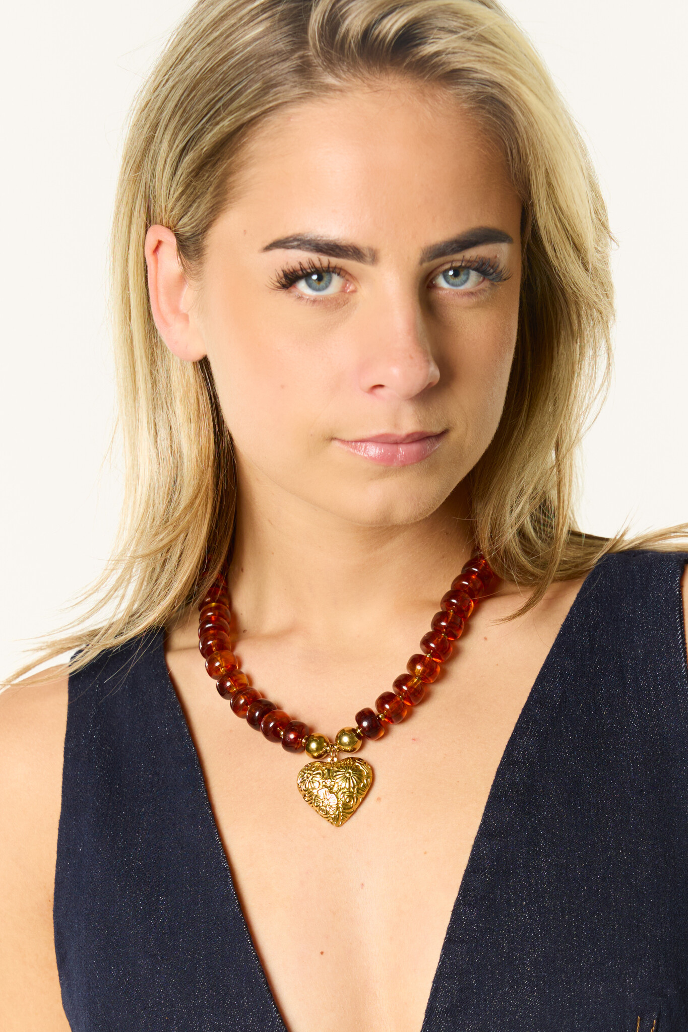 Kralenketting met gouden hart | Amber
