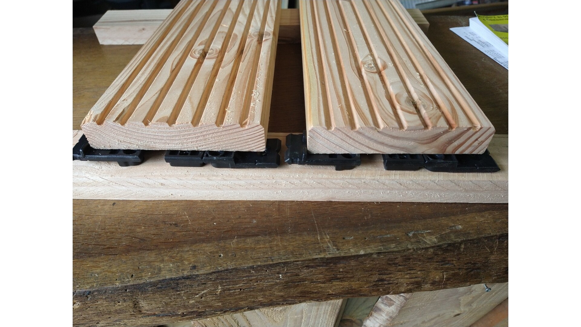Vlonderplank onzichtbare legstrip