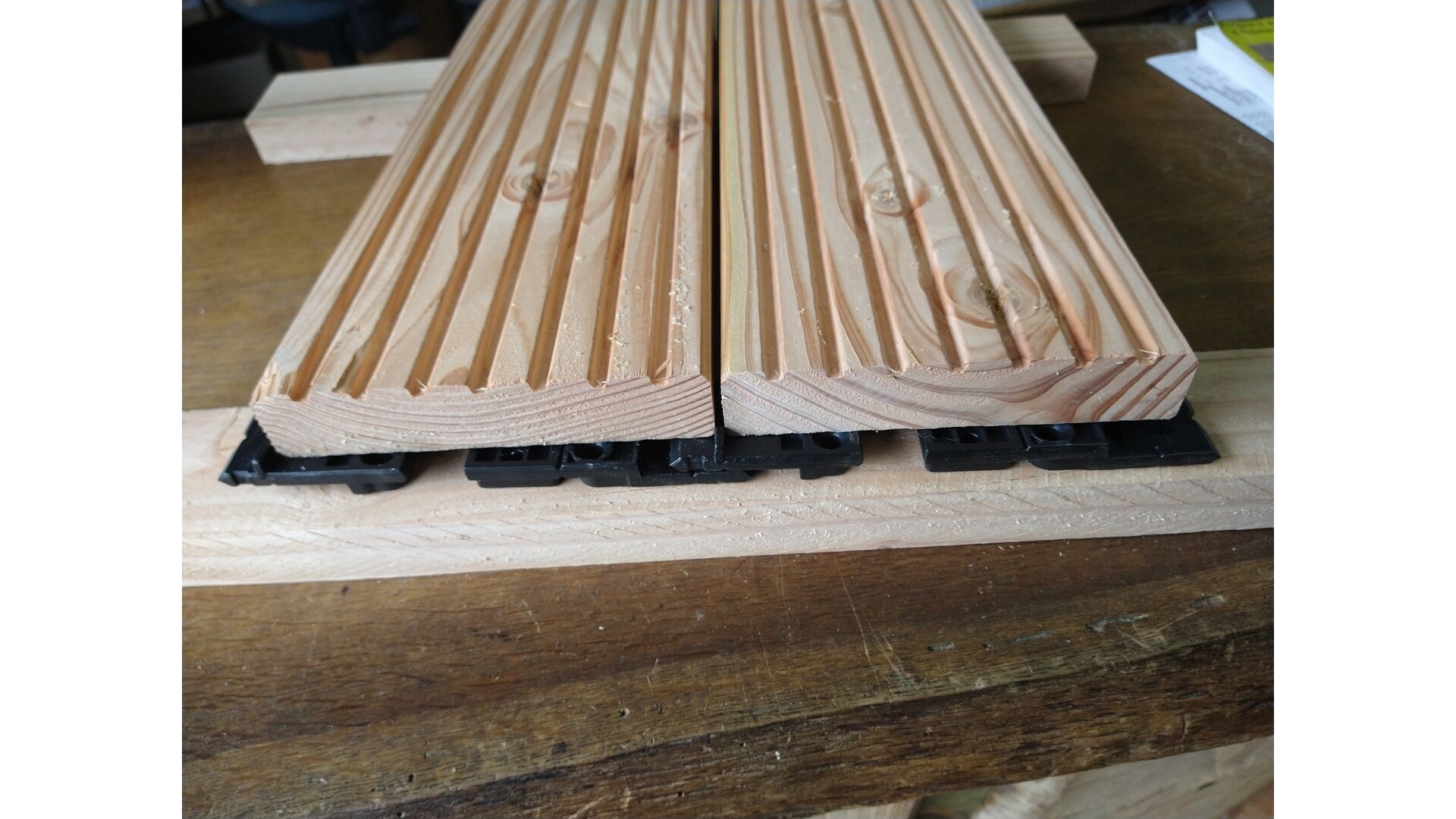 Vlonderplank onzichtbare legstrip