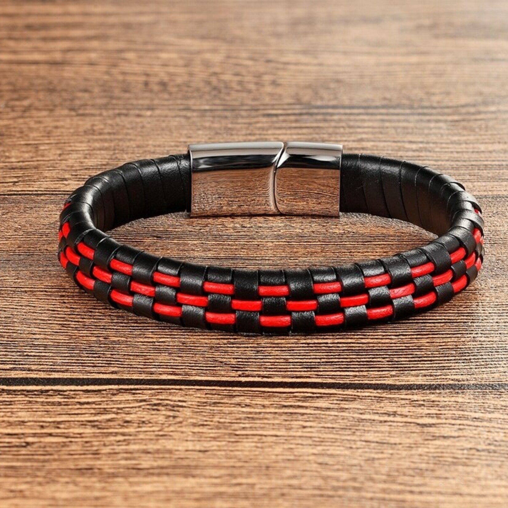 Nenzi Zwarte lederen gevlochten armband  6 mm met rvs knop 21 cm met knop 21 cm