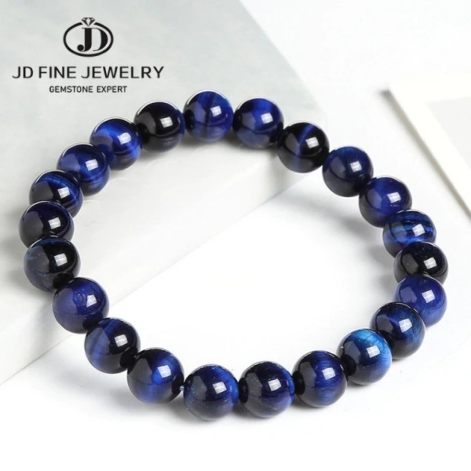 jd fine jewel ry Tijgeroog boeddha madblue stenen 10 mm