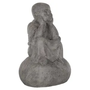 Dreaming Monk op een rots