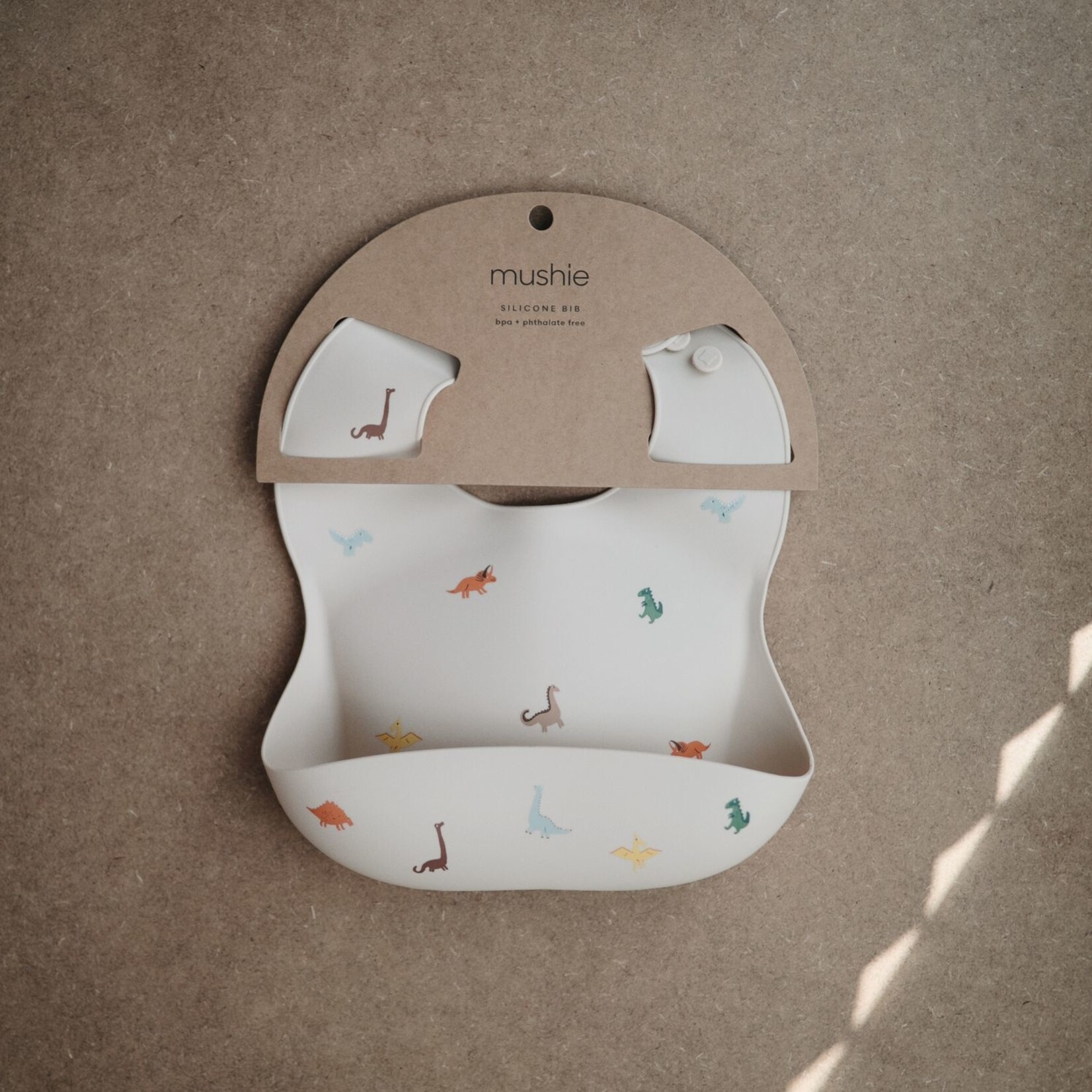 Mushie Silicone bib dinosaur