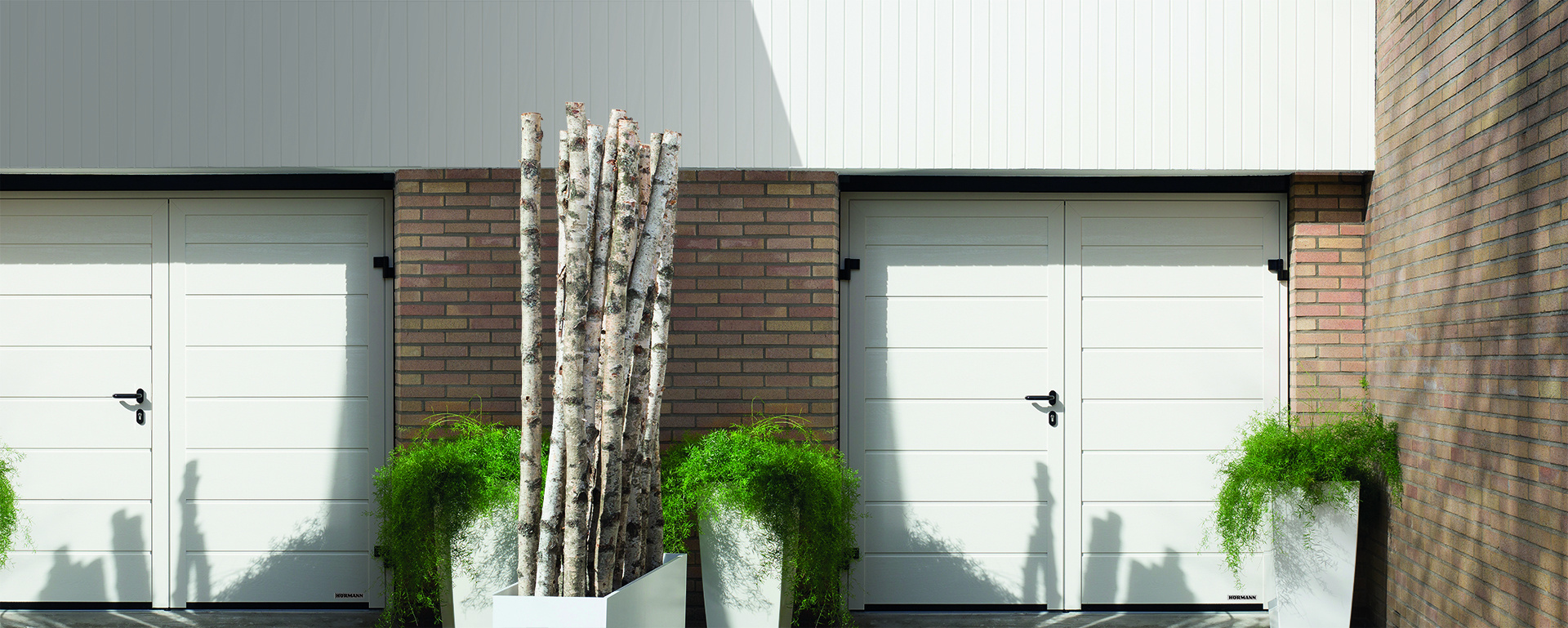 Nieuw! De openslaande garagedeuren van Hörmann