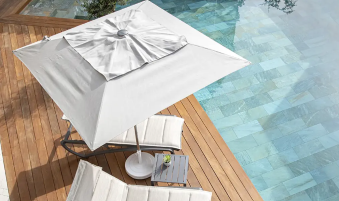Hoe krijg je weerplekken uit een parasol?