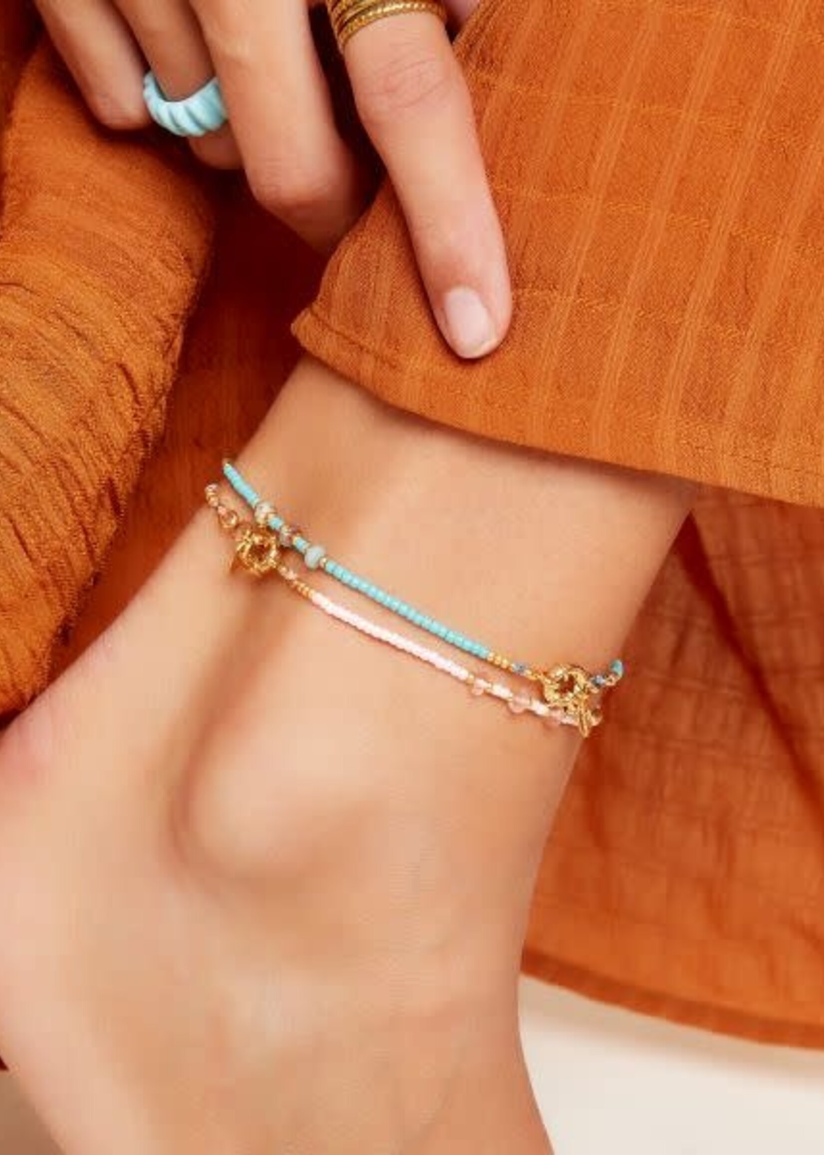 Flo Boutique Enkelbandje gekleurde kralen paars