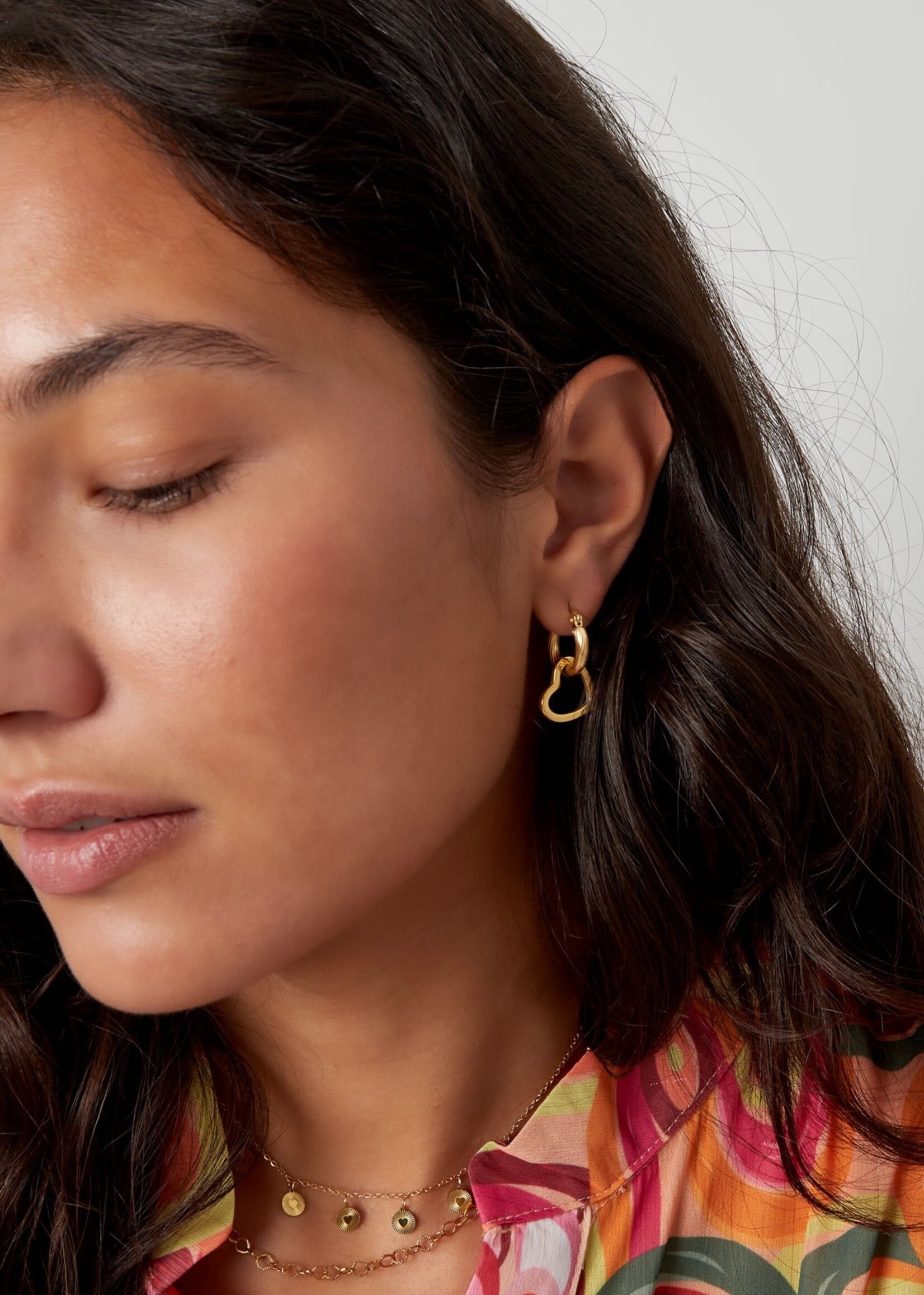 Flo Boutique Oorbellen twisted heart