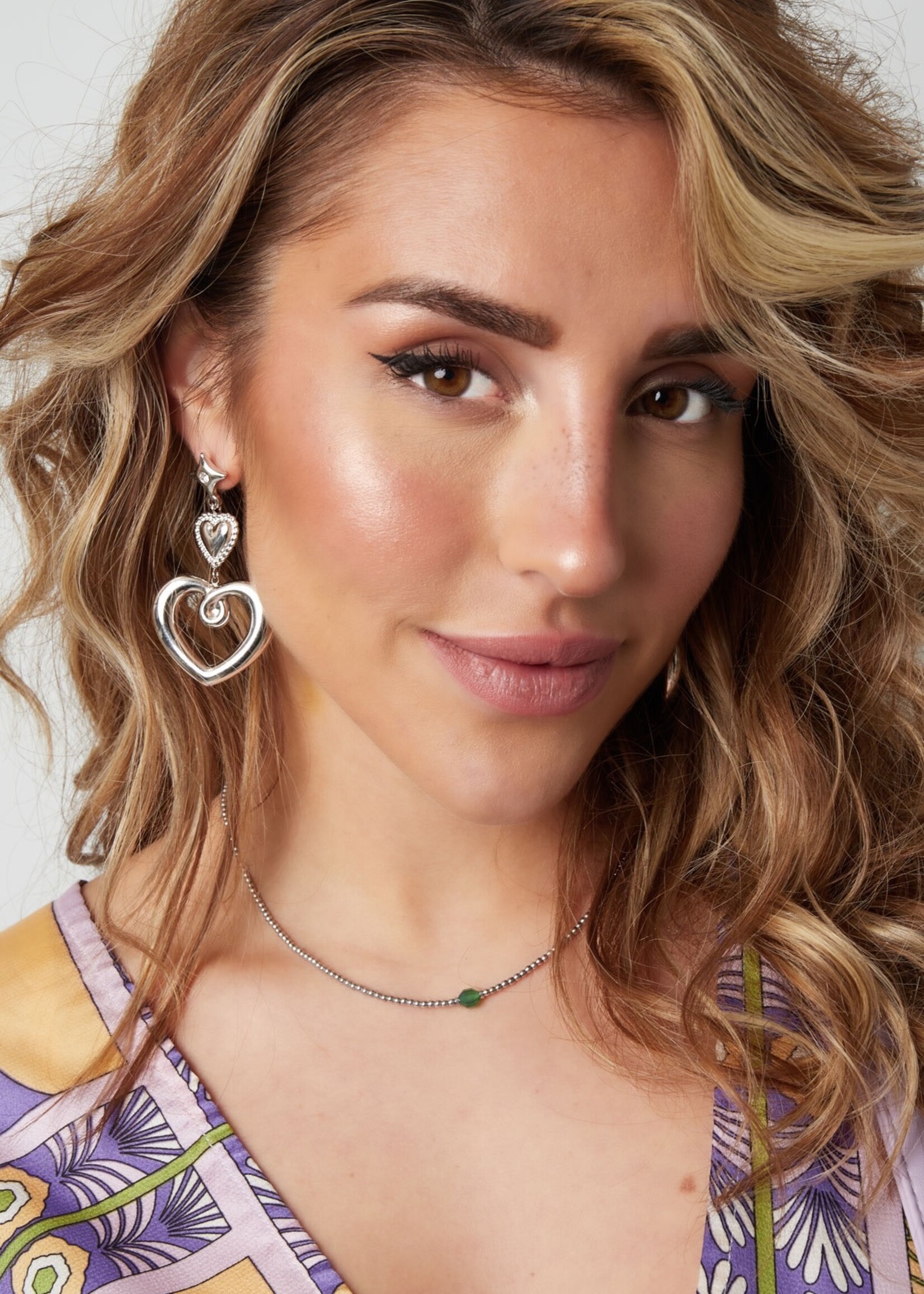 Flo Boutique Statement earrings charms