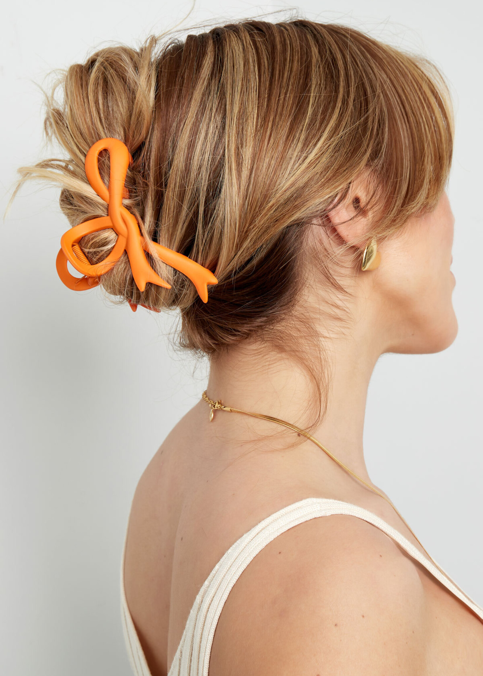 Flo Boutique Haarklem oranje strik