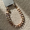 xoxo Wildhearts xoxo Wildhearts iPhone 17 - Funky Hearts (Champagne Pearl) Coque en transparente avec cordon xoxo Wildhearts xoxo Wildhearts iPhone 17 - Funky Hearts (Champagne Pearl) Coque en transparente avec cordon