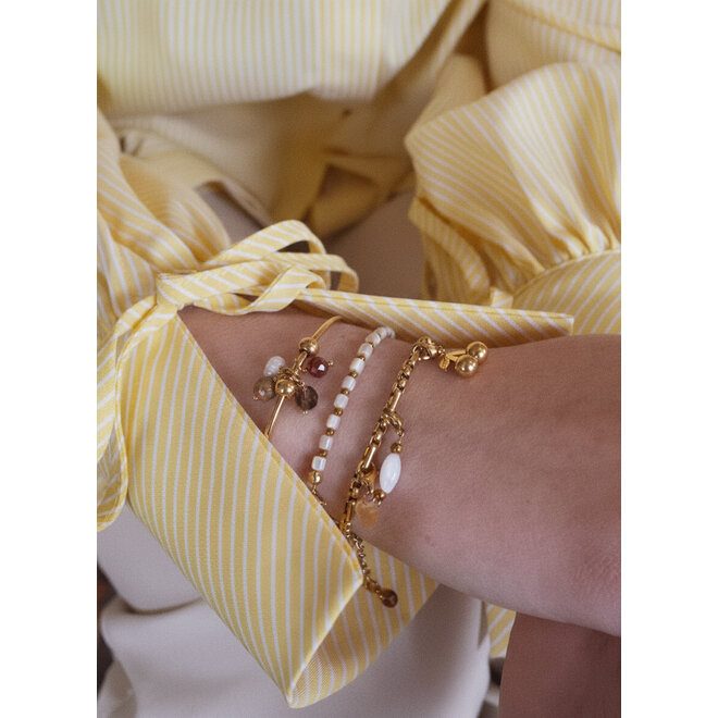 Charm oval shell wit goud