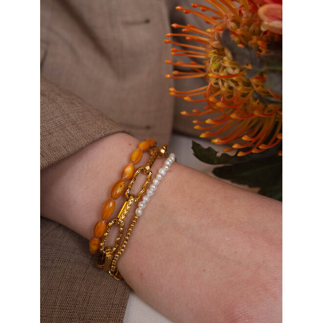 Armband oval shell oranje goud