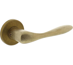 Intersteel Deurkruk Banaan met rozet verdekt ø49x7mm messing getrommeld