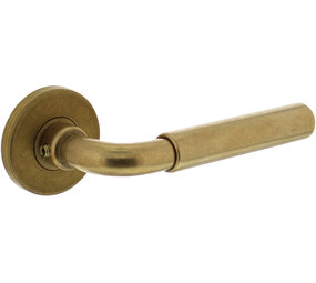 Intersteel Deurkruk Palma met rozet verdekt ø49x7mm messing getrommeld