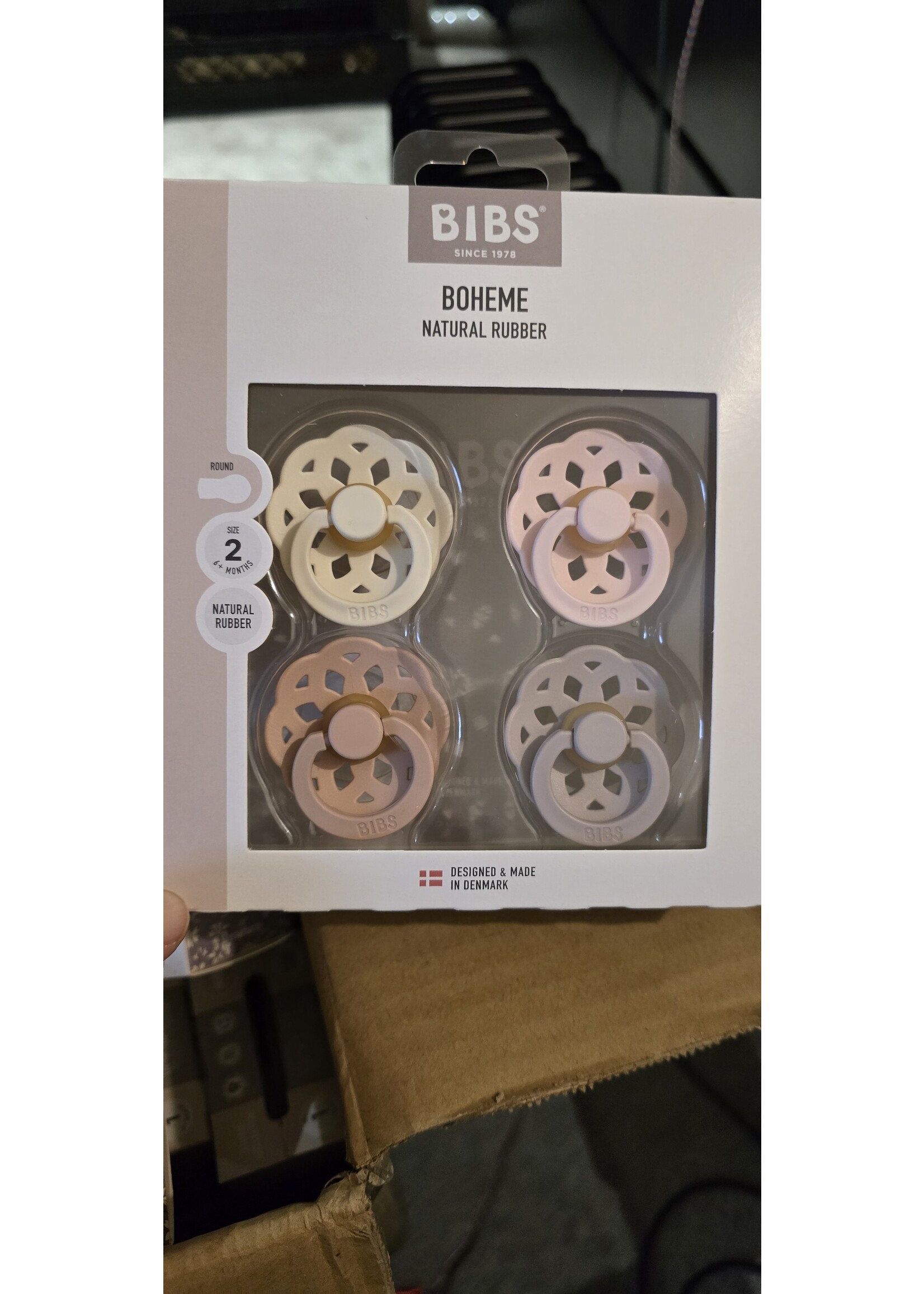 Doos met 4 bibs spenen bloem