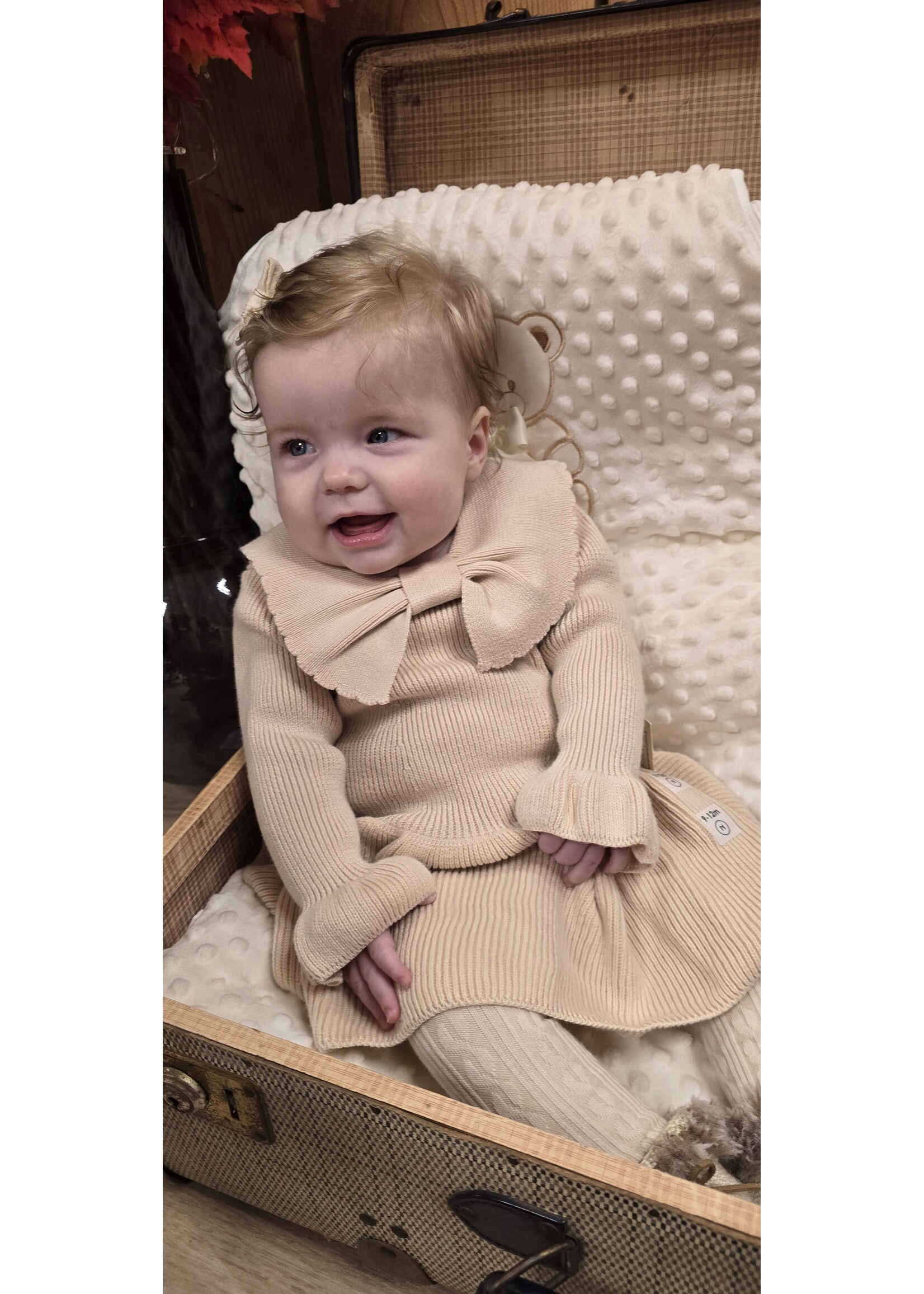 Gebreid jurkje met strik