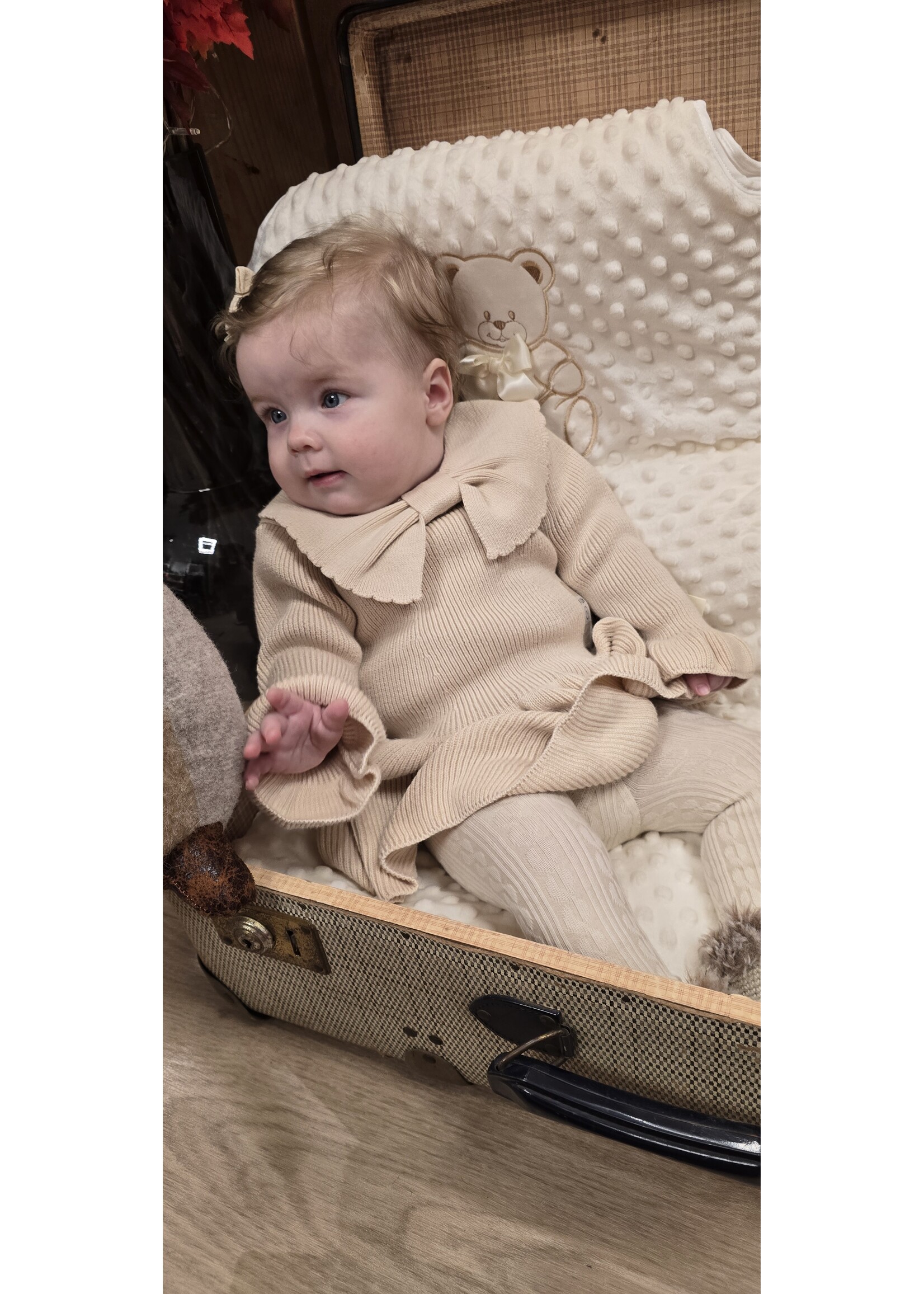 Gebreid jurkje met strik