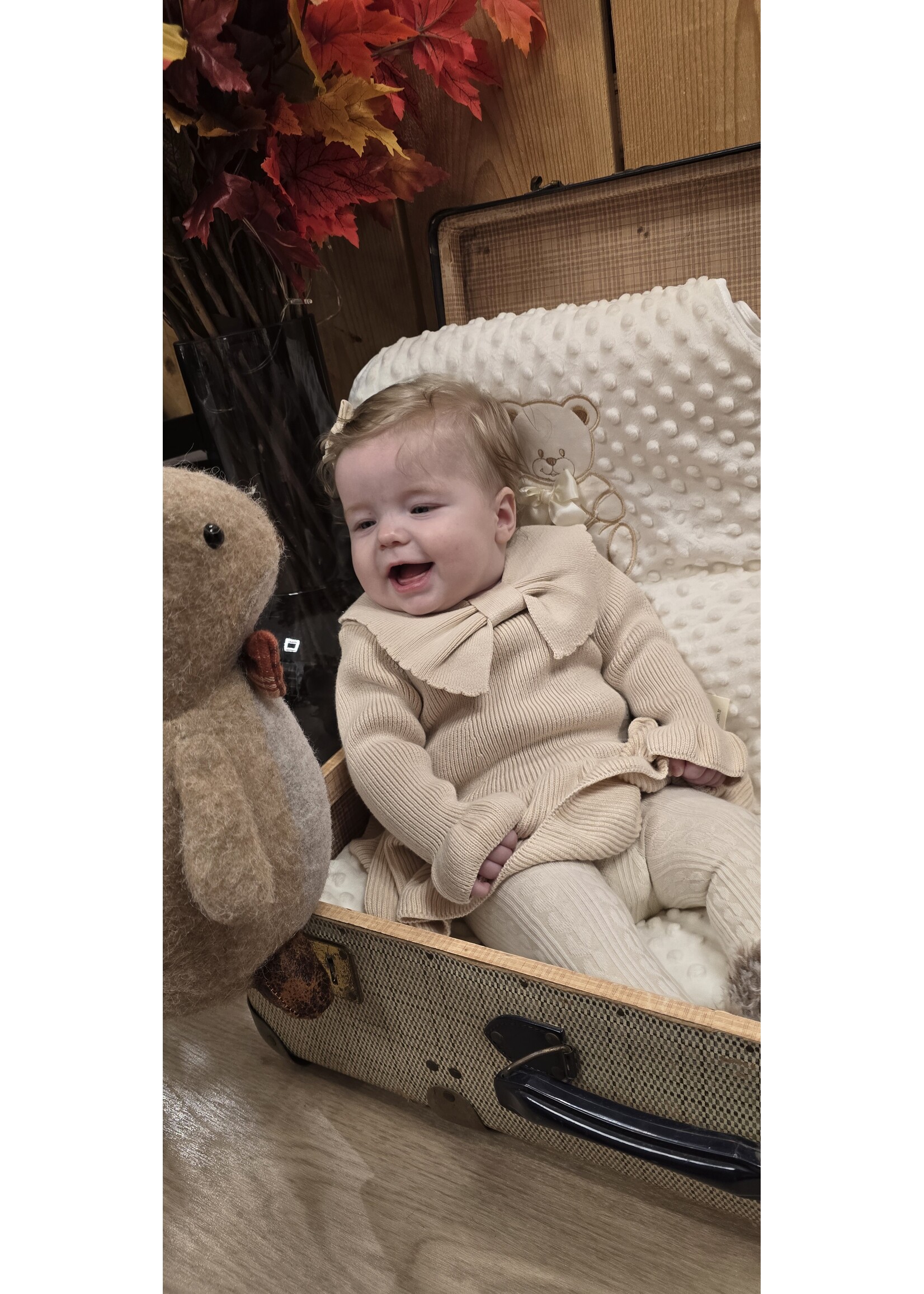 Gebreid jurkje met strik