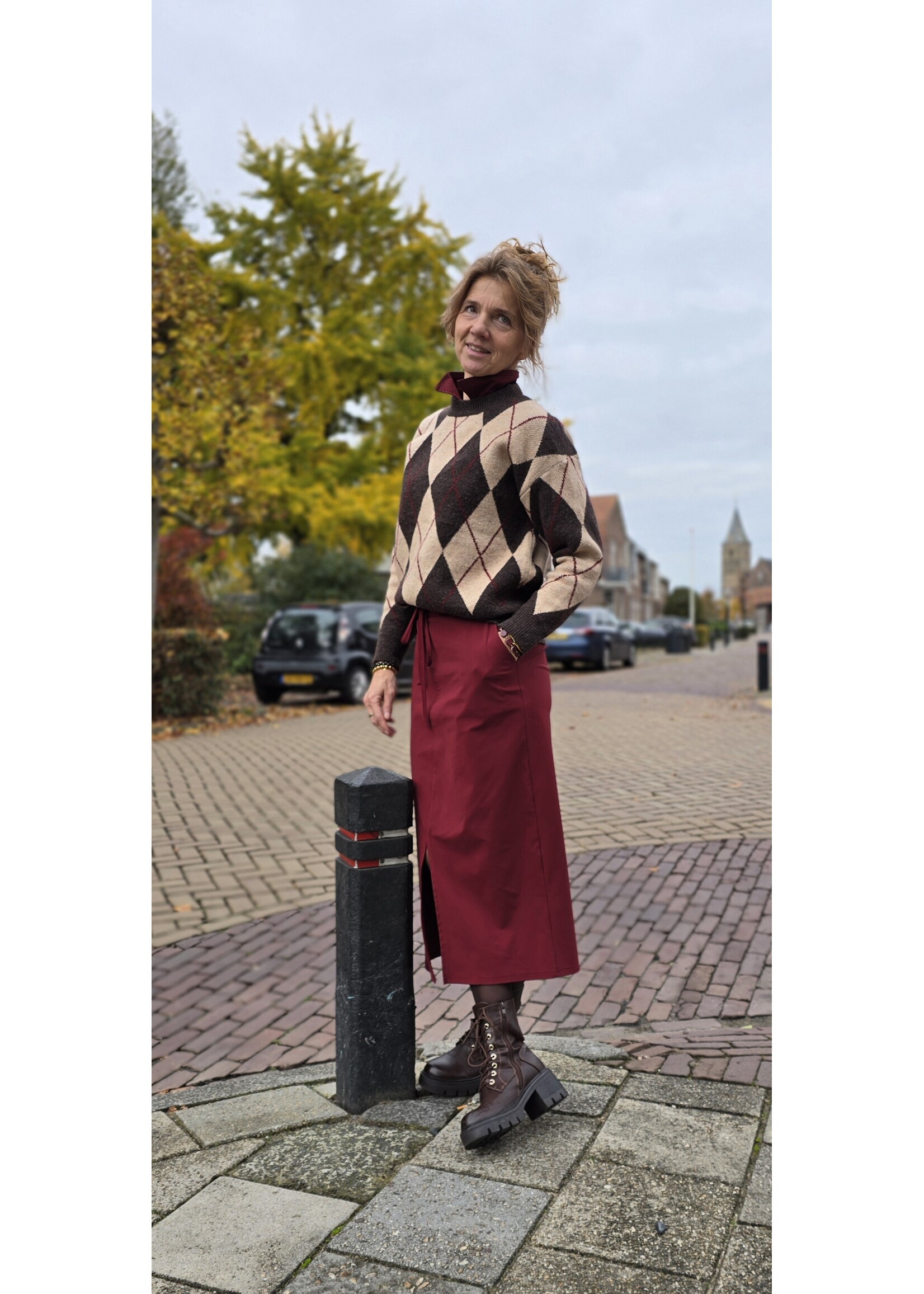 Knitted trui ruit motief