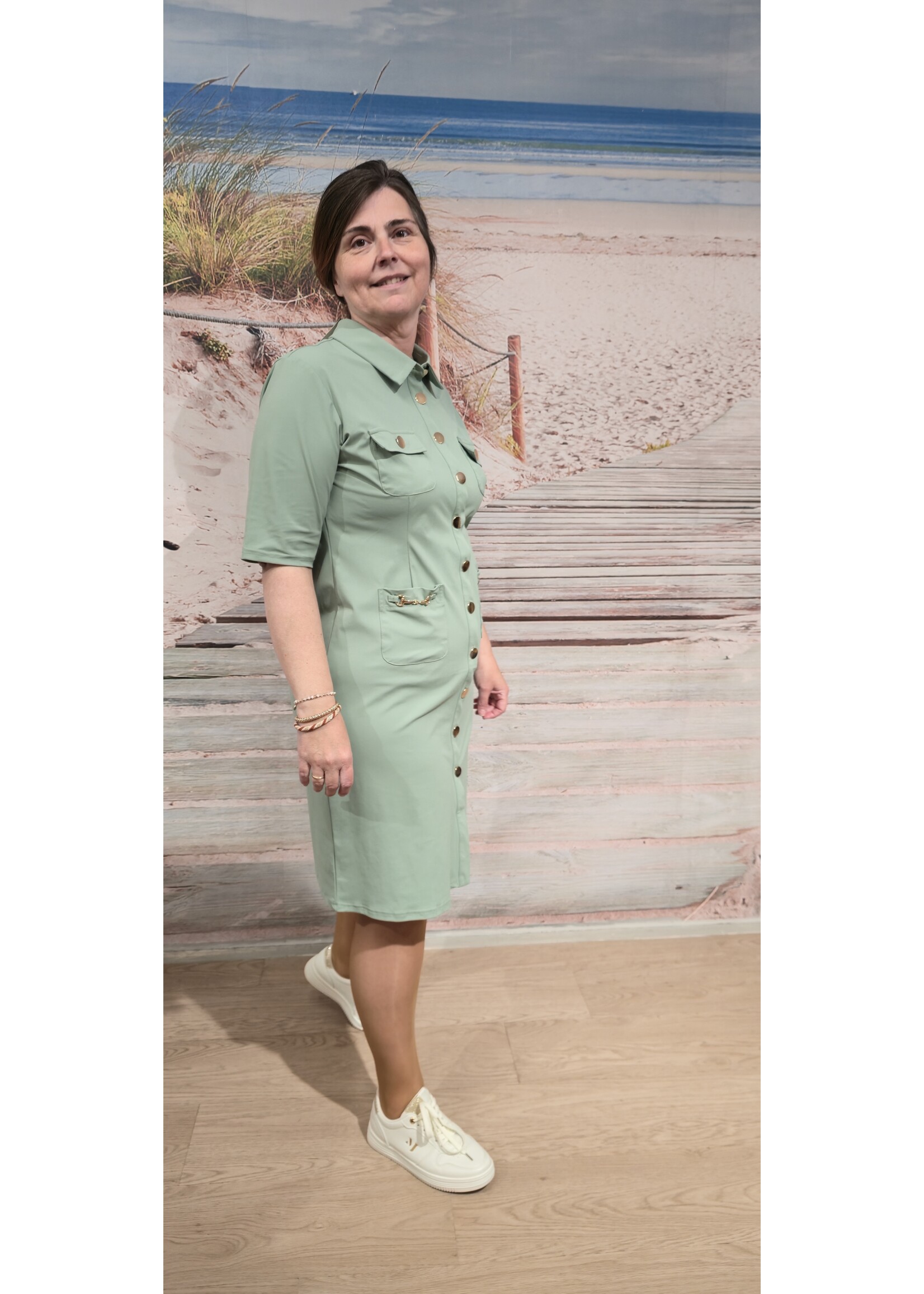 Tripple Nine dress met gouden details
