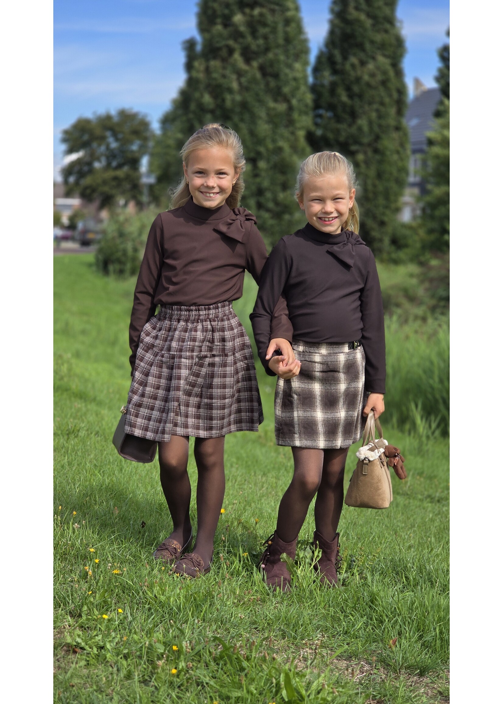 Top met strik twee kleuren