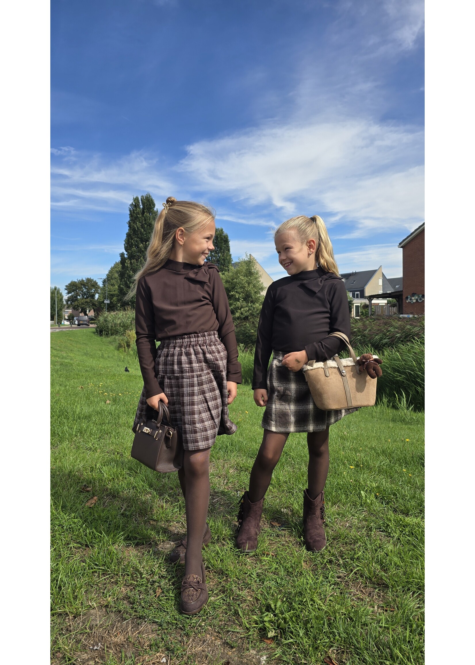 Top met strik twee kleuren