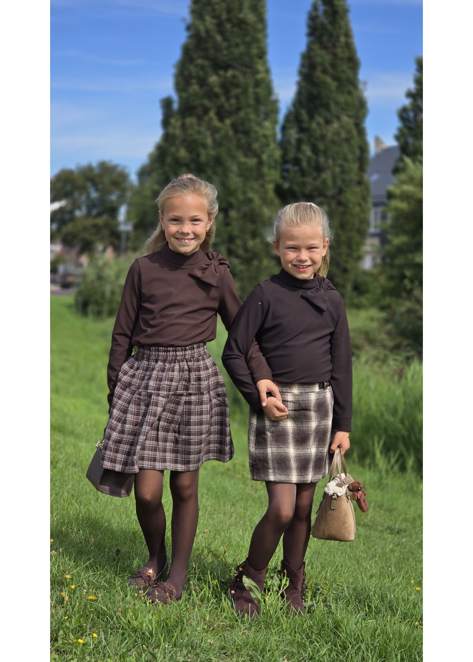 Top met strik twee kleuren