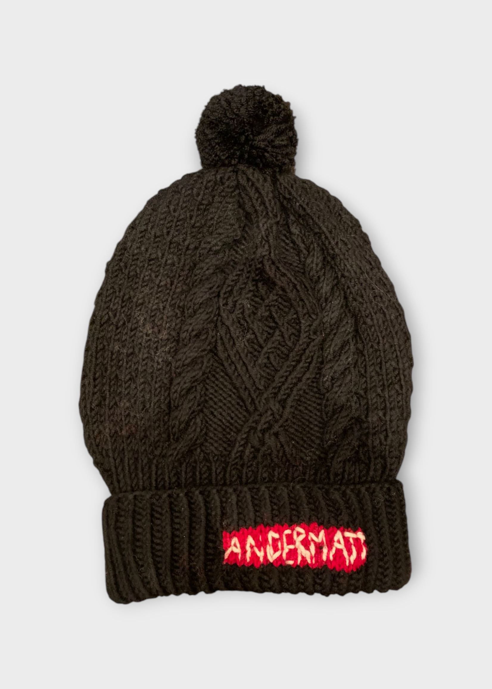 Michaela Buerger Michaela Buerger Hat, Multi, Wool Knitted Andermatt Beanie In Black w/ Red Logo & Pom Pom x Tasoni