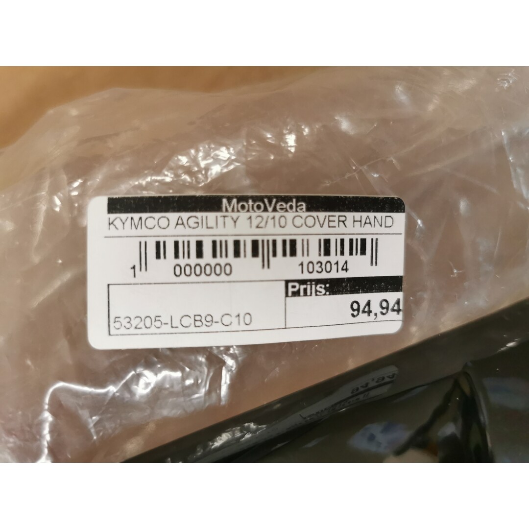 Kymco Agility 12/10 / Cover hand / stuurkap buiten / Nieuw 50% korting / 53205-LCB9-C10