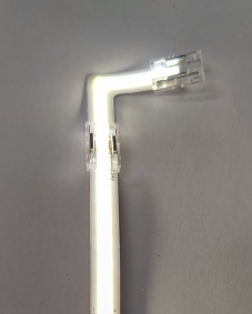Doorverlichte 24 volt COB LED Strip - 90 graden transparante hoek connector T.B.V. 4000K natuurlijk witte COB LED Strips - IP20