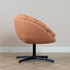 Fauteuil pivotant Porto tissu lin orange cuivre