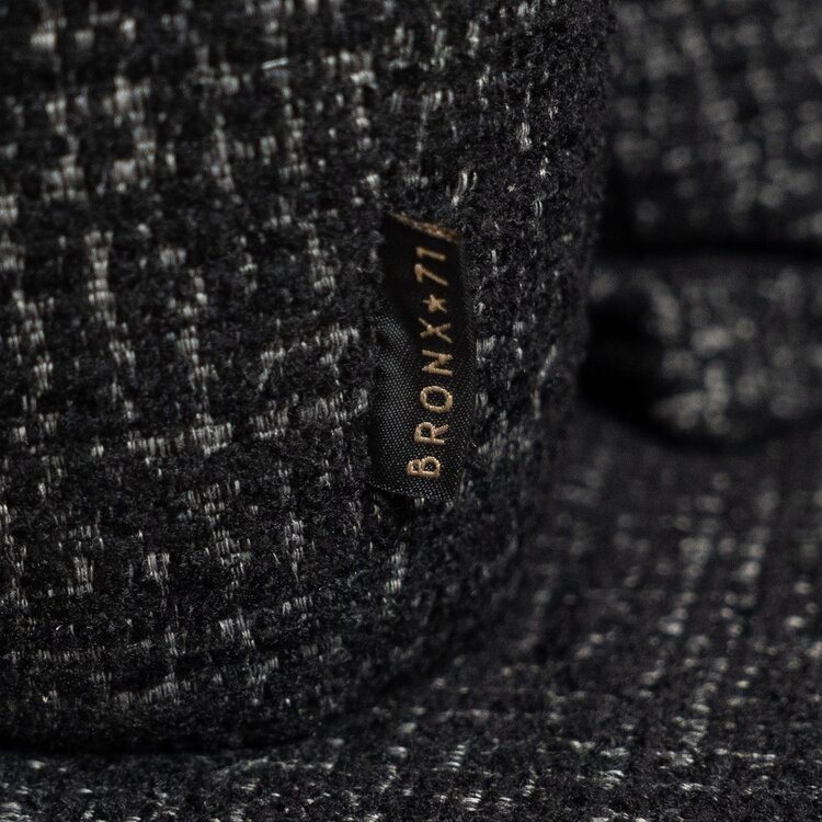 Fauteuil Fallon pivotant en tissu chiné noir