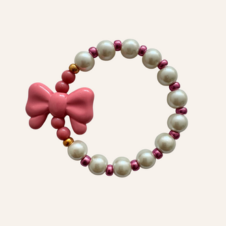 By Melo By Melo Armbandje Strik roze