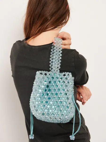 Hvisk Poke beads bag blue mist