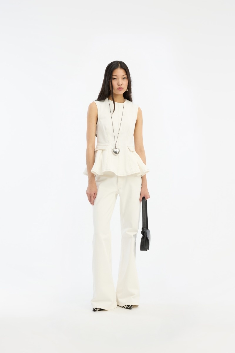 ROTATE Peplum denim top Raw white denim