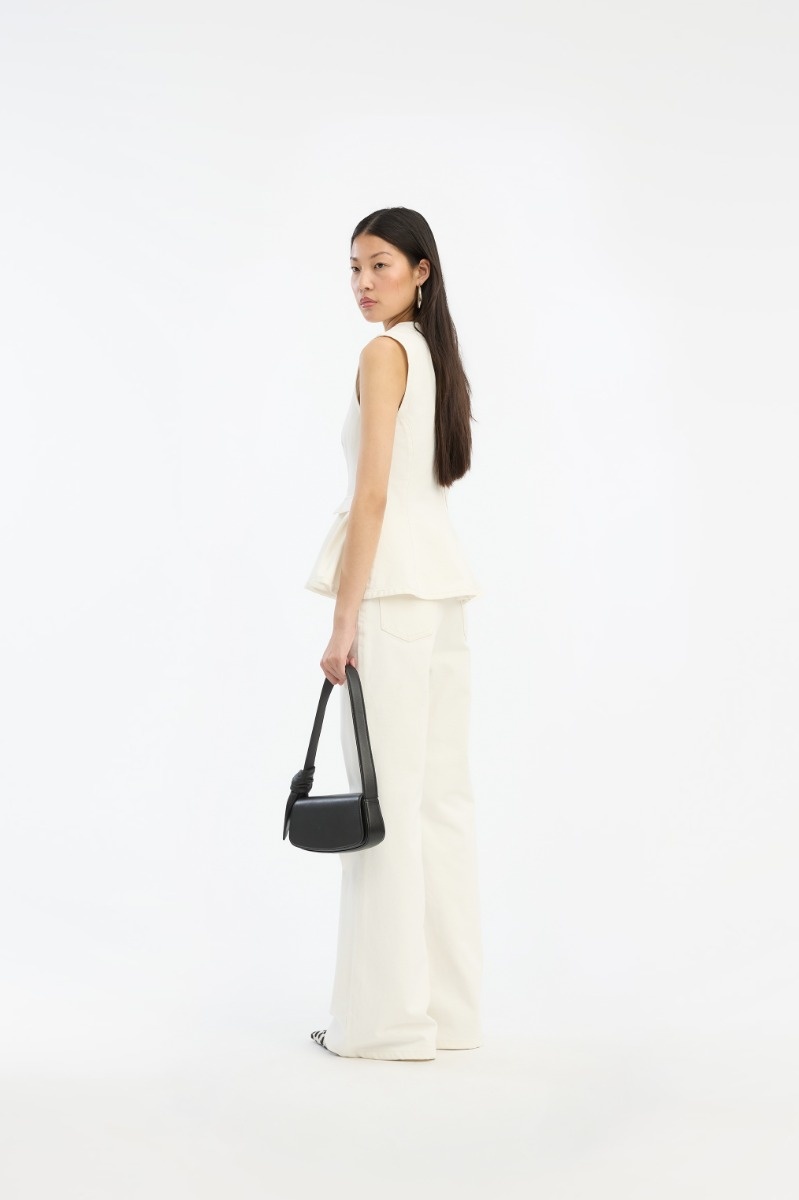 ROTATE Peplum denim top Raw white denim