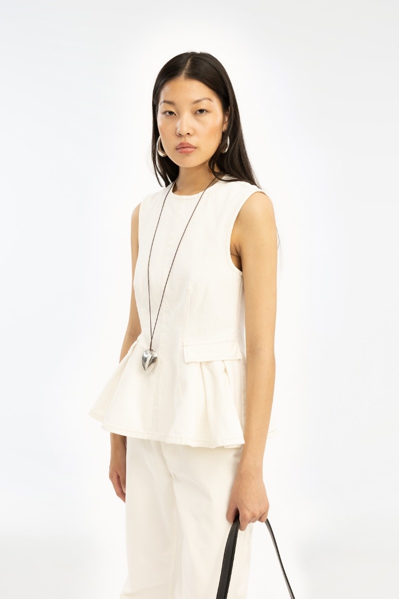 ROTATE Peplum denim top Raw white denim
