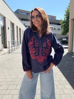 GEBORDUURDE BLOUSE