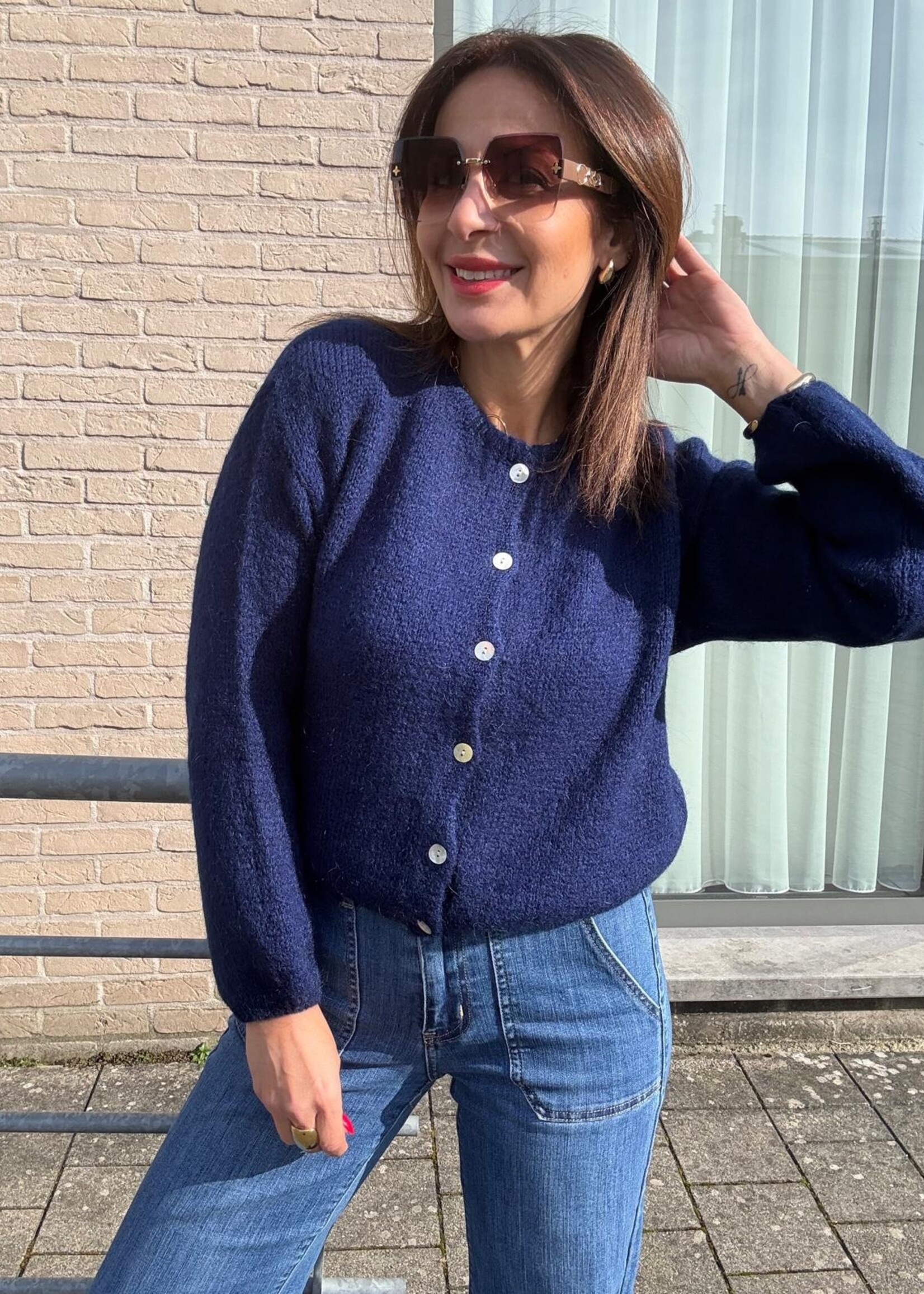 Vest maxima met knopen en ronde hals