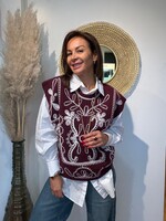 ELEGANTE GEBORDUURDE PONCHO