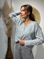 TRUI MET KANT OP DE SCHOUDERS