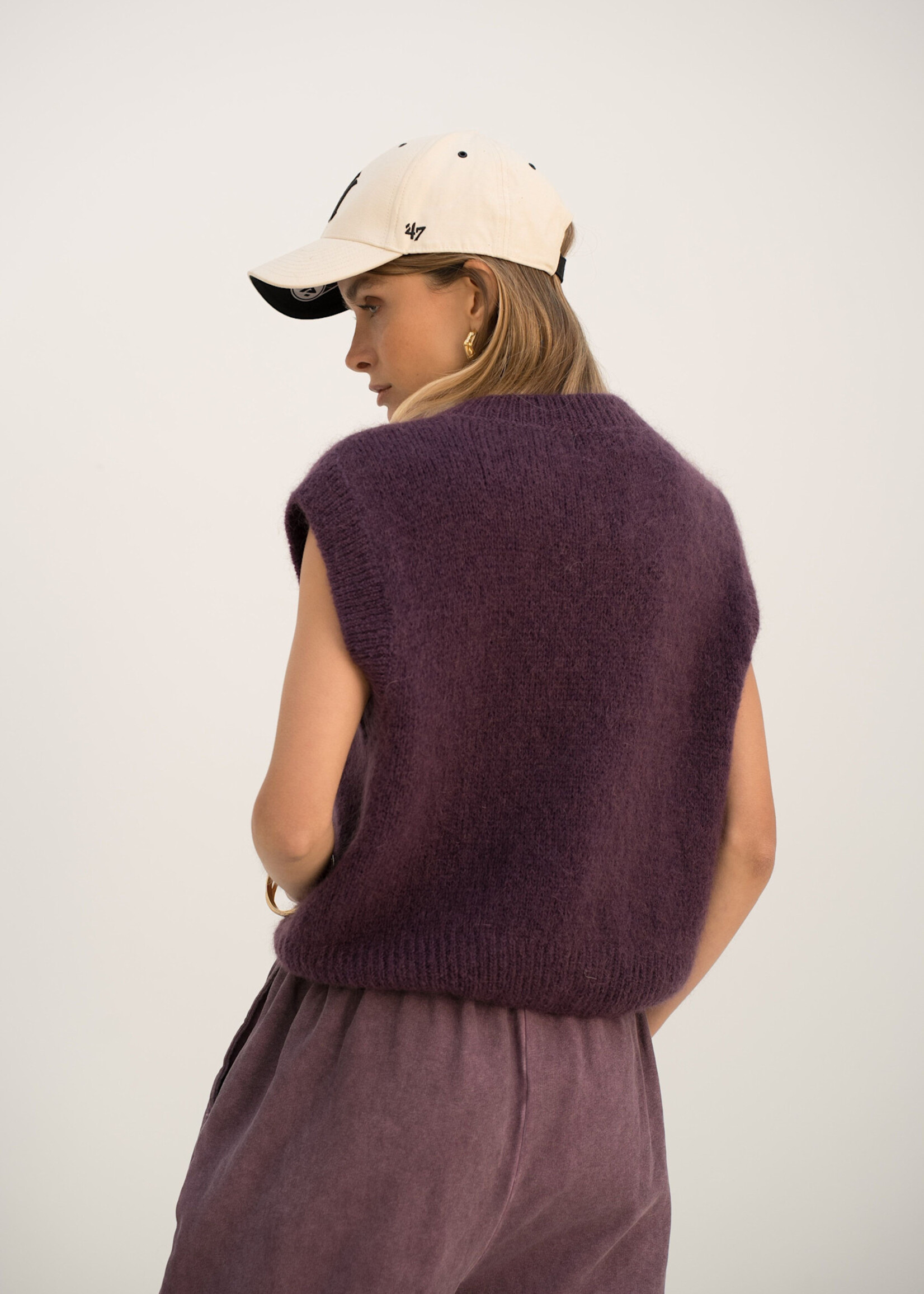 Mouwloos vest in mohairmix met knopen