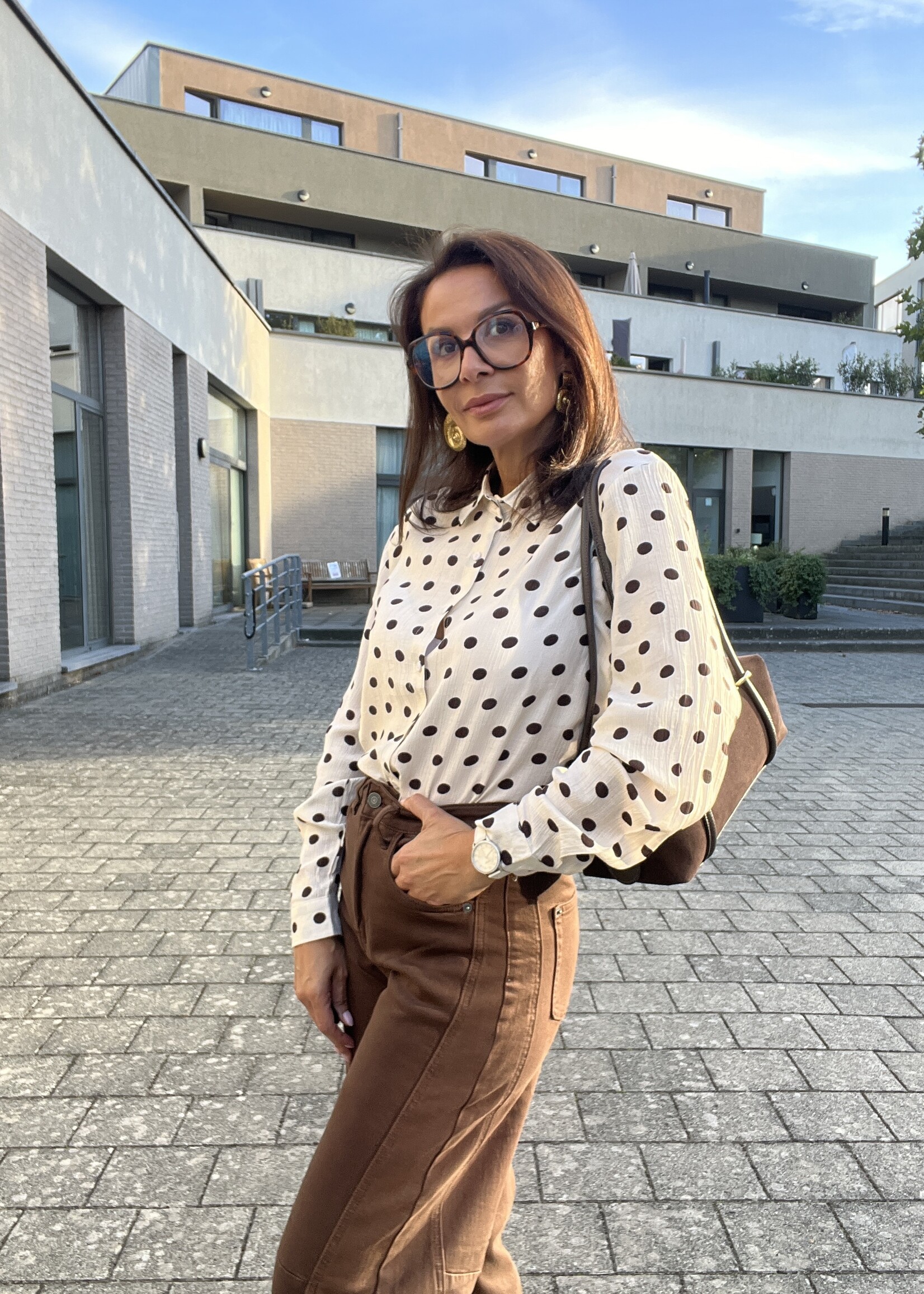 Soepelvallende blouse met stippen