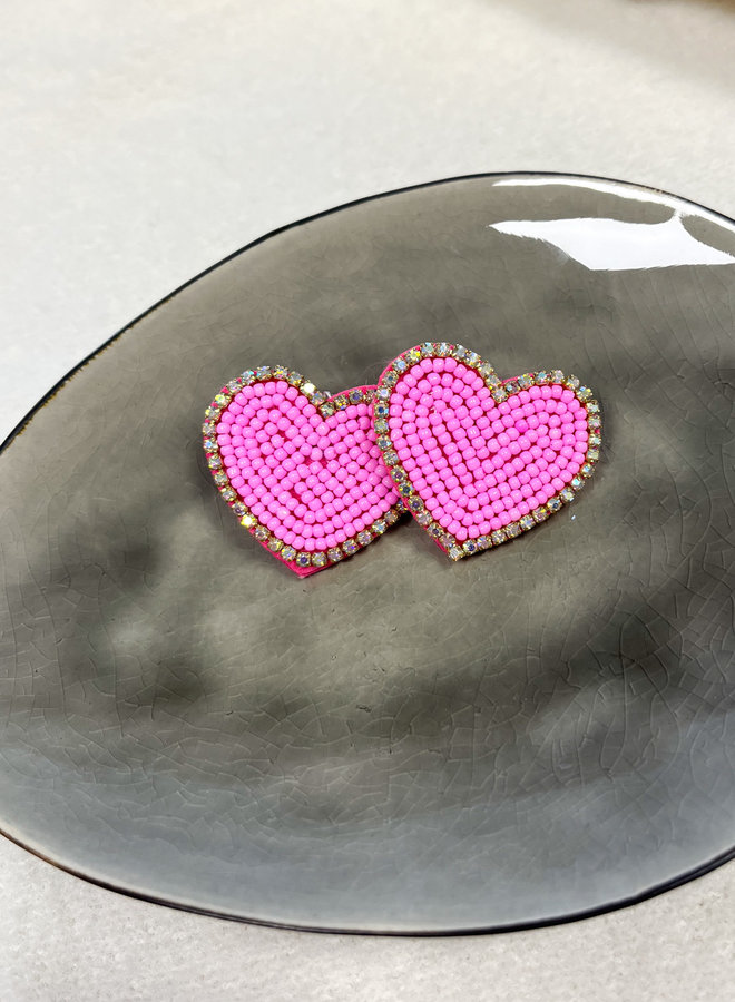 Oorbellen hart roze kralen