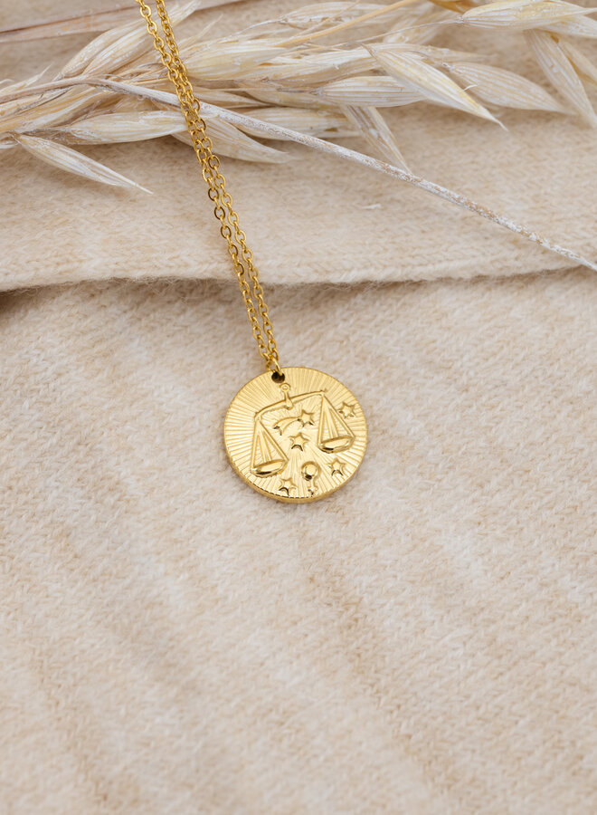 Sterrenbeeld ketting weegschaal goud